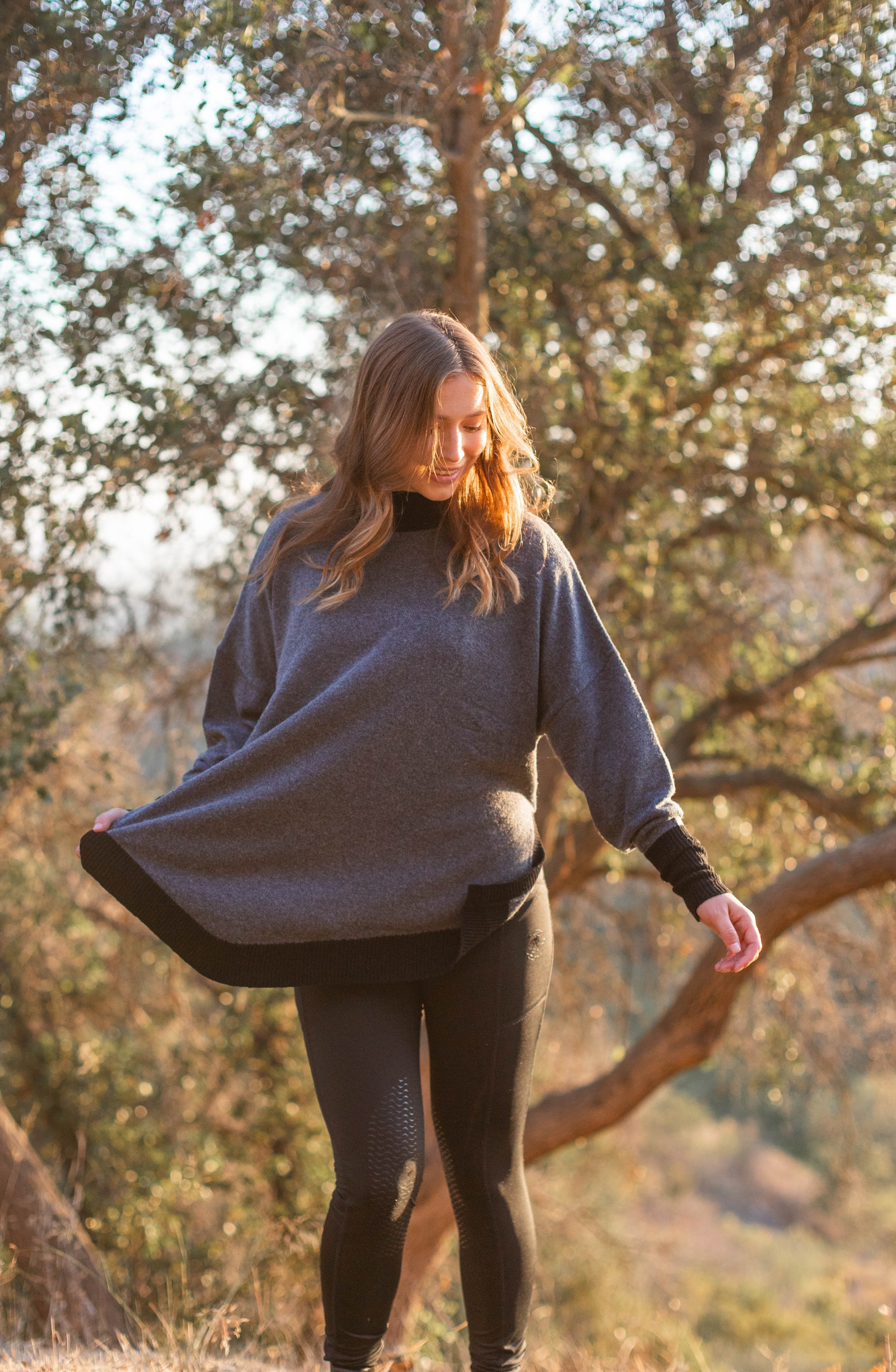 Hannah Childs Addison Riding Poncho with Sleeves - Hannah Childs Lifestyle - Equiluxe Tack